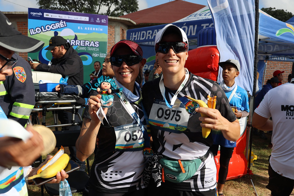 Corredores con medalla